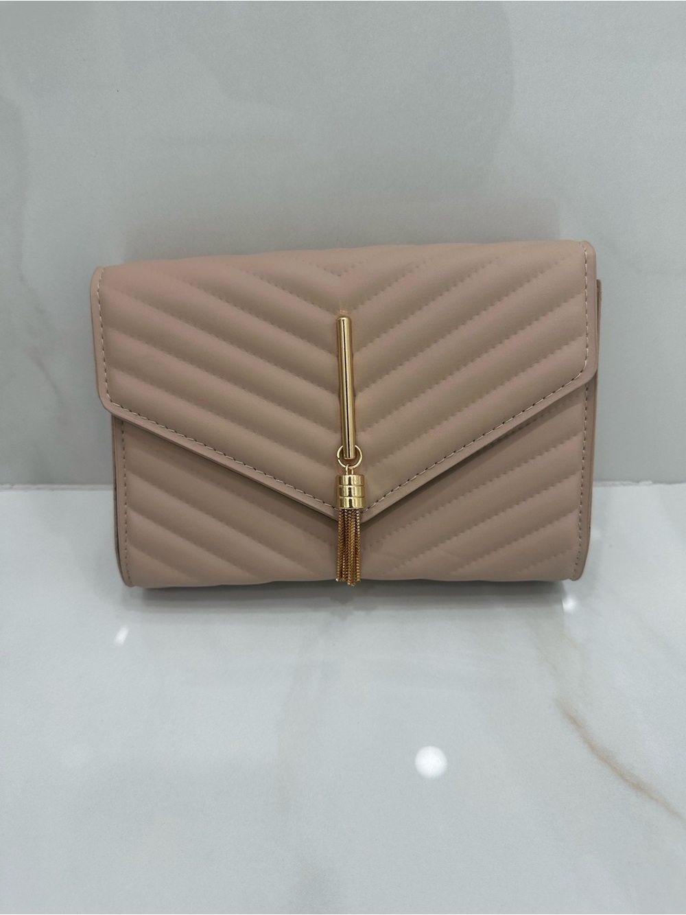 Women's Chevron Tassel Clutch Bag in Beige